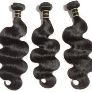 Three bundles of hair are laying next to each other.