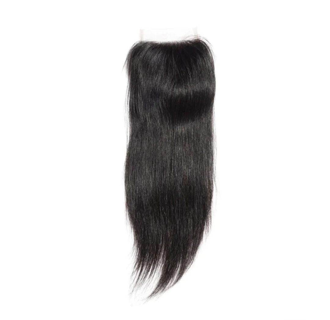 A black hair piece is shown on a white background.