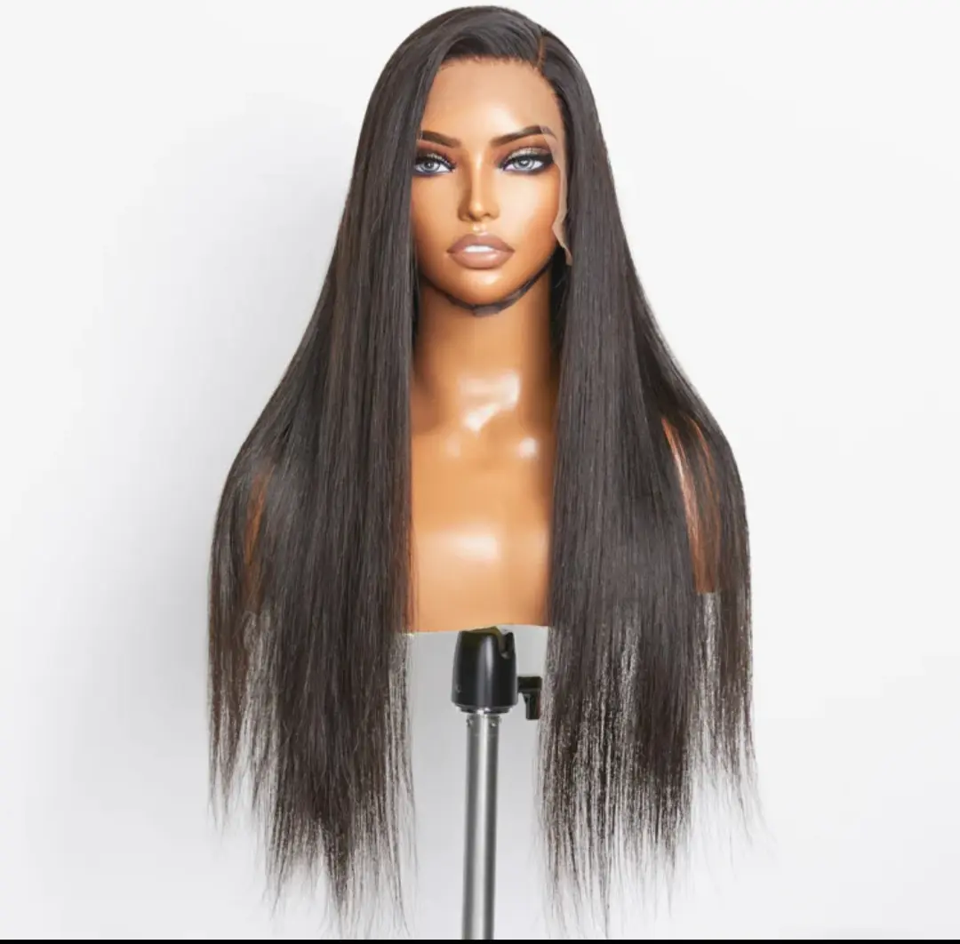 A mannequin with long hair on display.