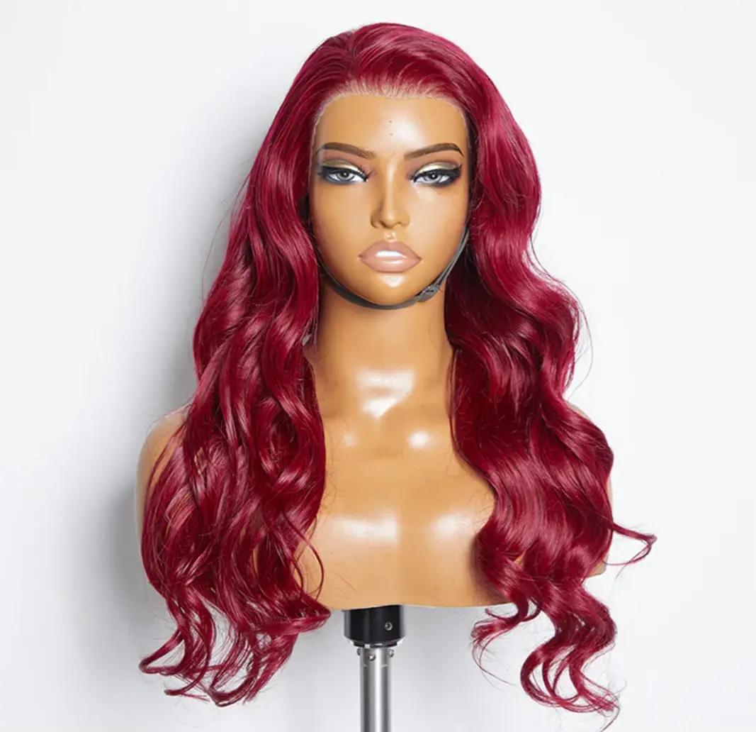 A mannequin wearing a long red wig.
